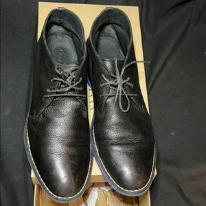 ColeHaan black leather moccasin Blue sole accent.